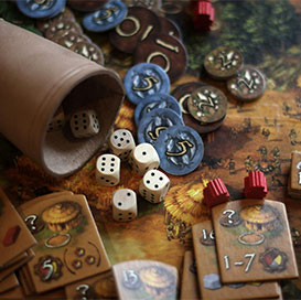 Imagen que muestra un juego de mesa y sus componentes